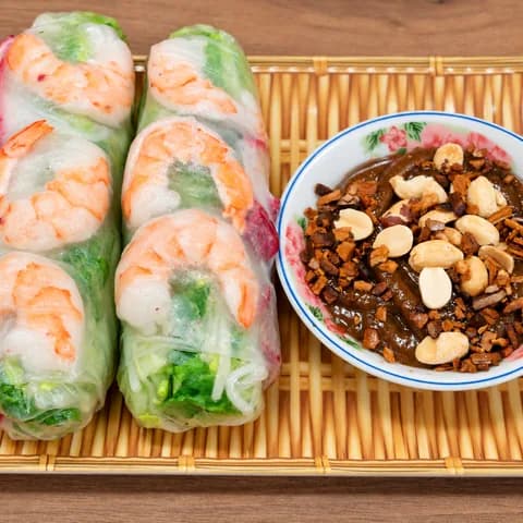 Fresh Vietnamese spring rolls with shrimp, herbs and rice noodles